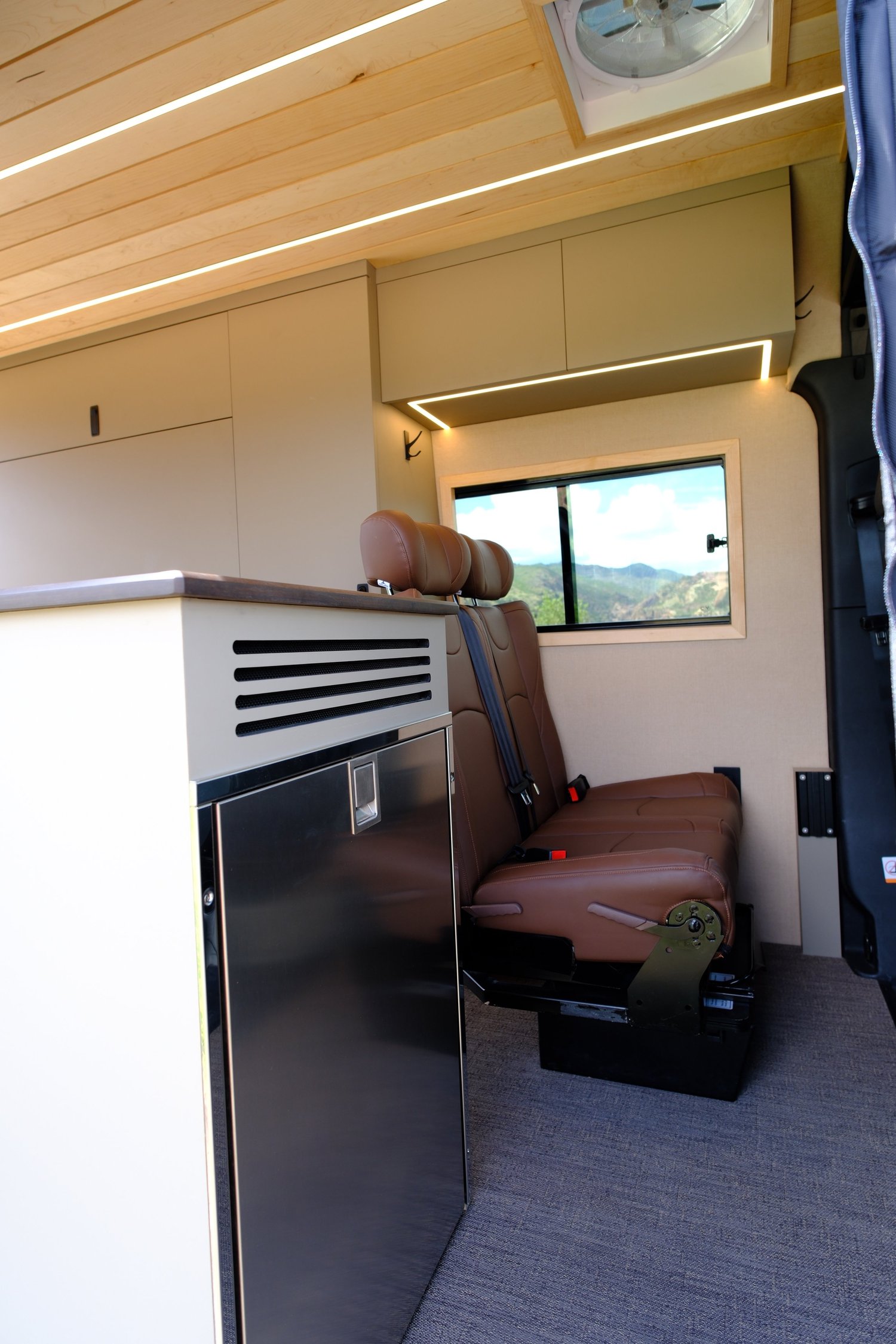 Ember interior with a large kitchen and two passenger seats