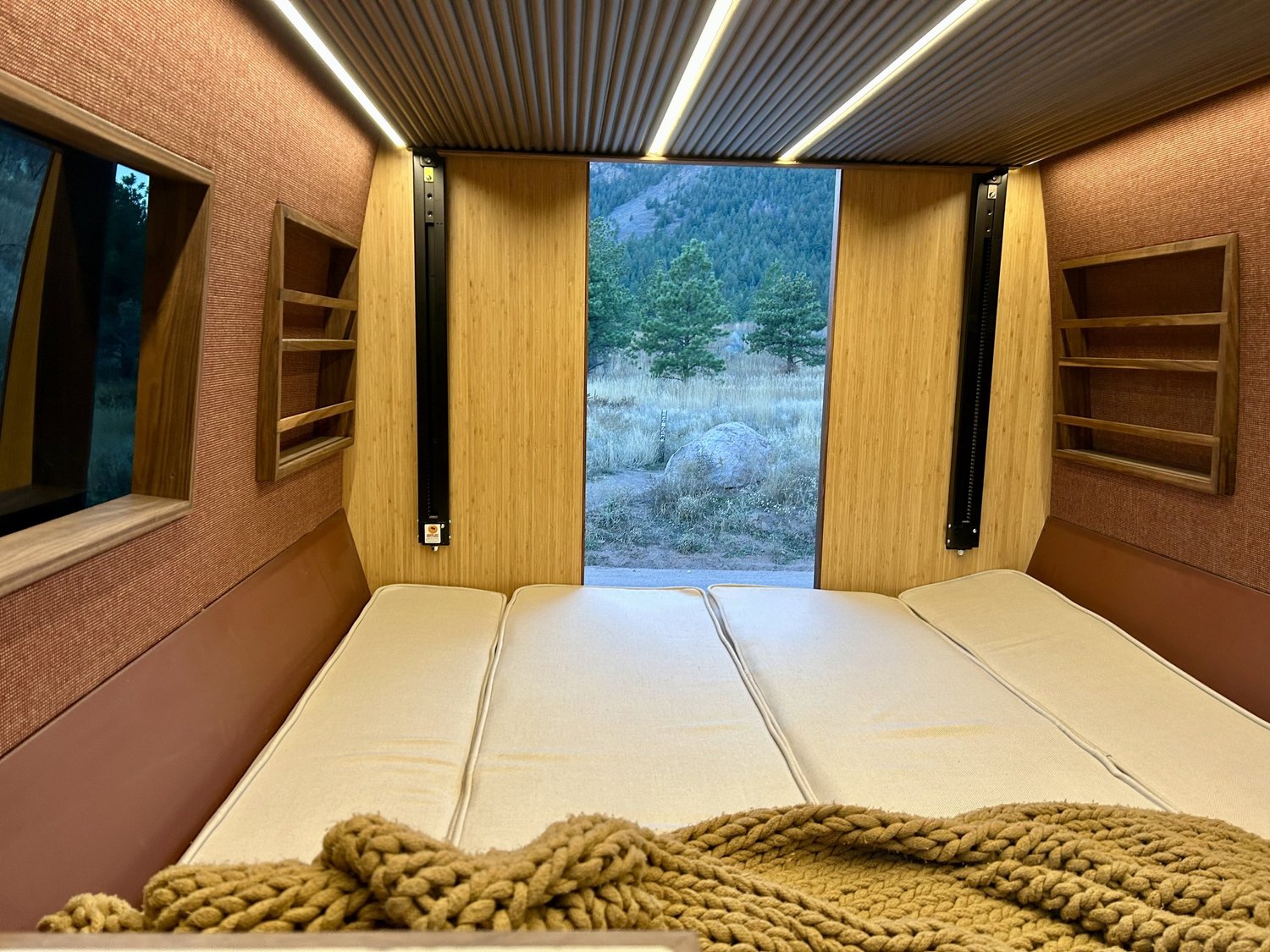 Sienna rear sleeping area with windows on both sides