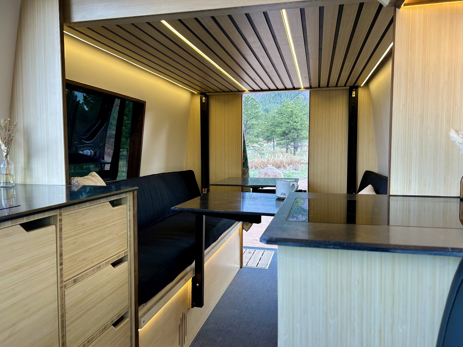 Slate interior with dark countertops and a rear dinette