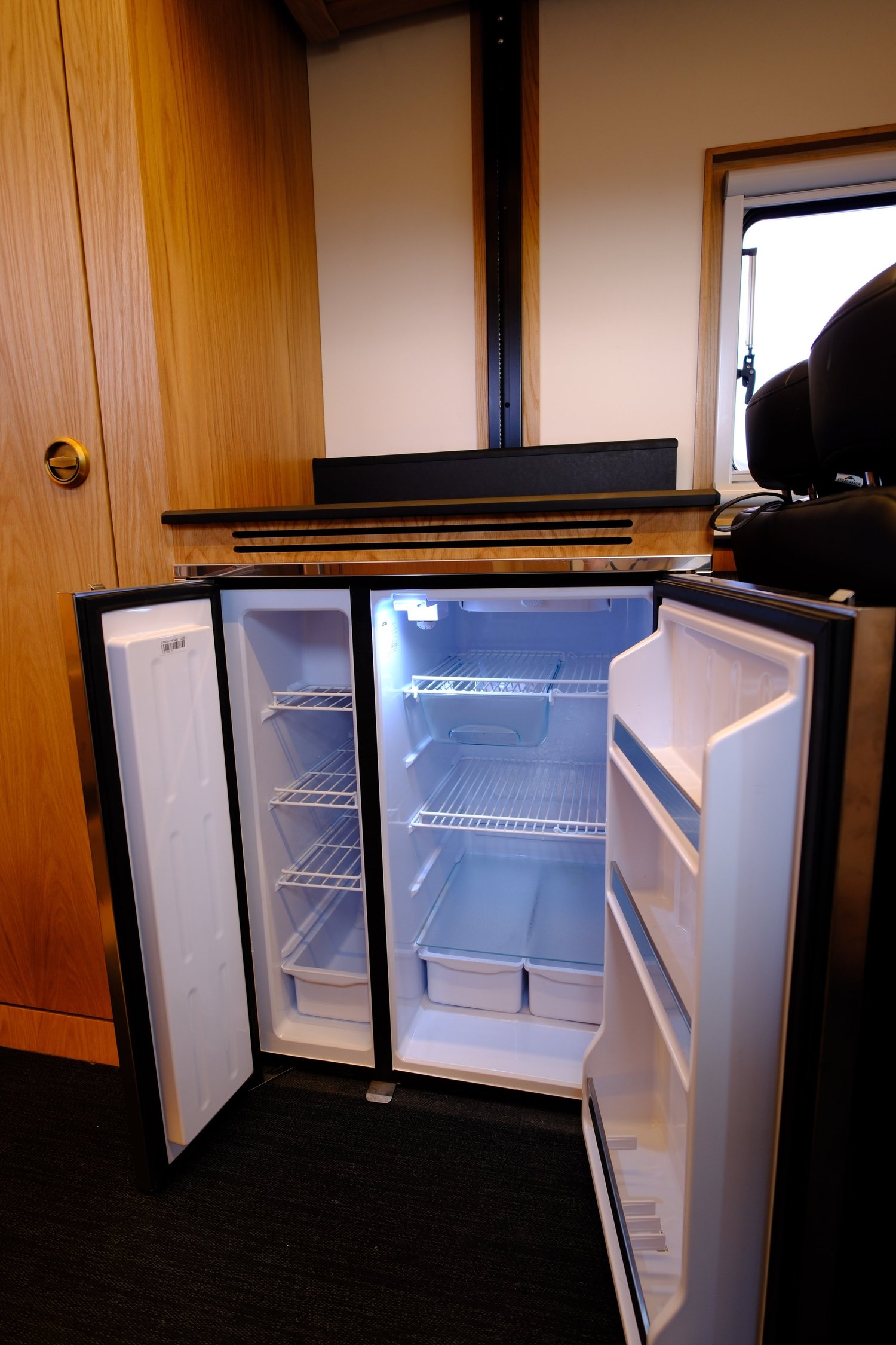The Nest refrigerator and freezer with both doors open.